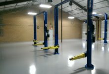 Thumbnail - empty auto shop after floors have been refinished